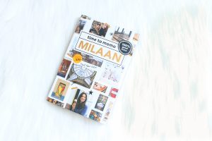 flatlay of a travel guide book called Time to momo Milan